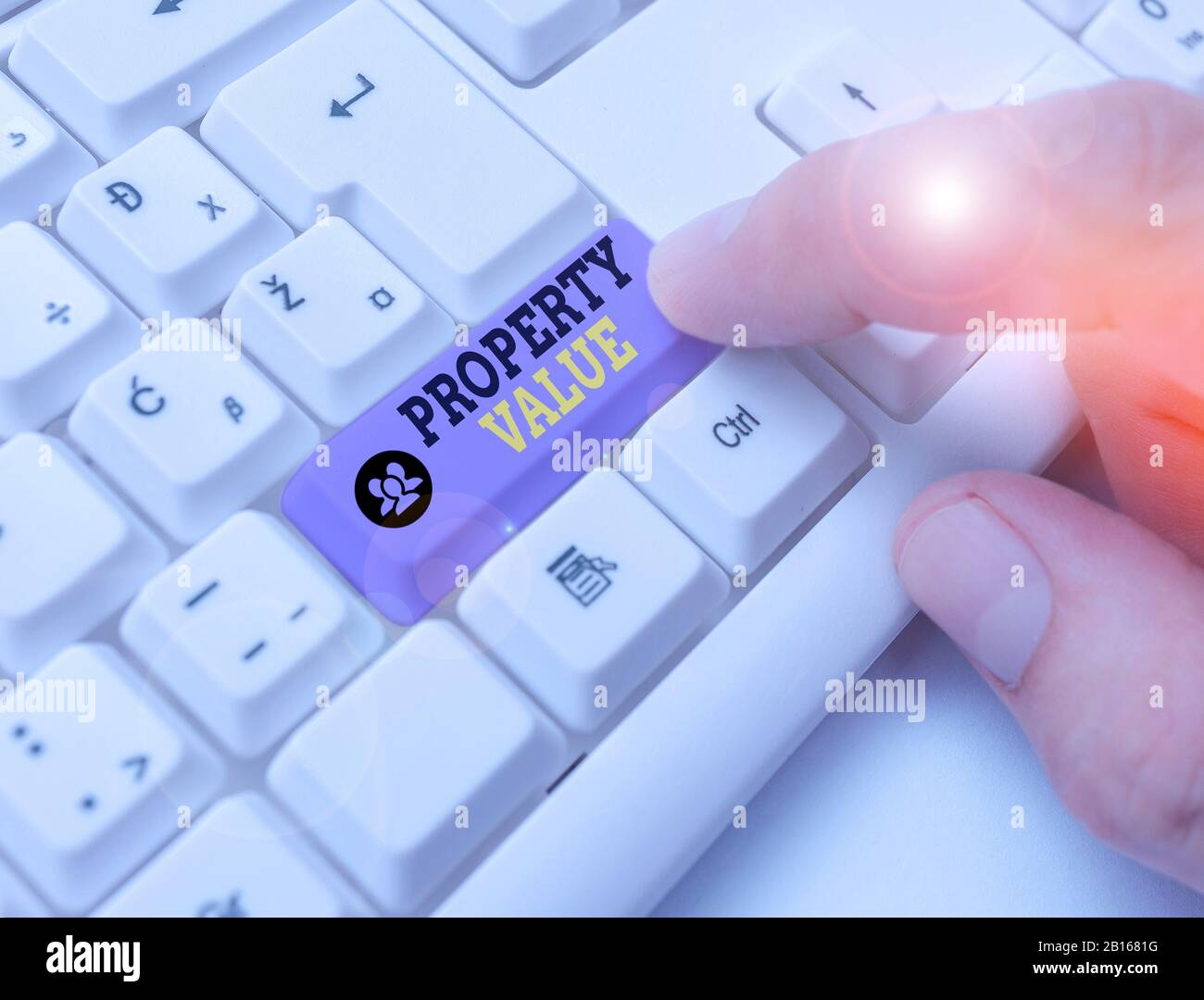 Conceptual hand writing showing Property Value. Concept meaning refers to the fair market value of a given piece of property Stock Photo