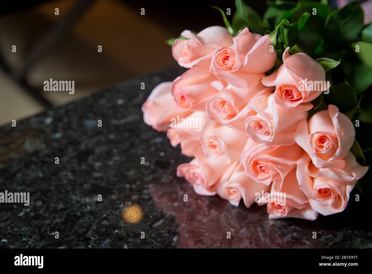 Background with violet ,pink roses on a black marble background . Pink ...