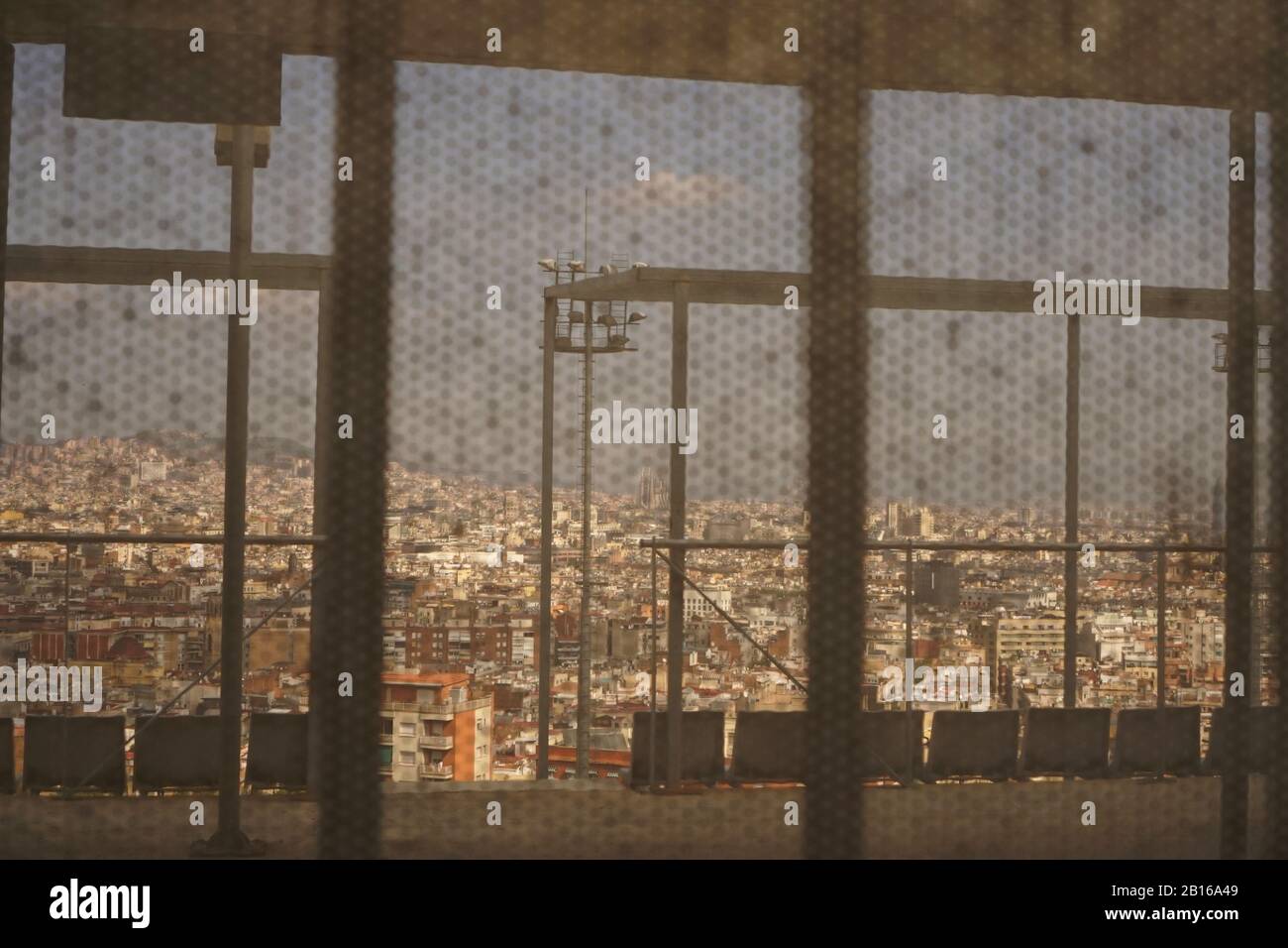 View of Barcelona city through a metal mesh wall Stock Photo