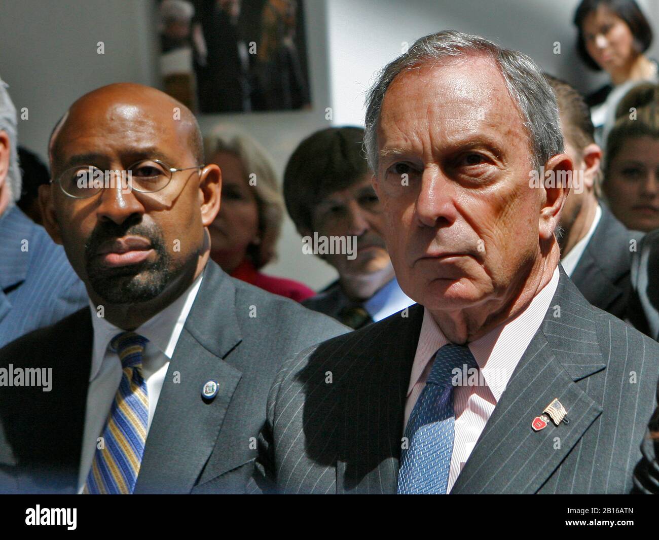 Mayors Michael Nutter of Philadelphia, Pennsylvania, left, and Michael Bloomberg of New York, New York  listen as United States President Barack Obama makes a speech about immigration reform at American University on Thursday, July 1, 2010. .Credit: CNP /MediaPunchP Stock Photo