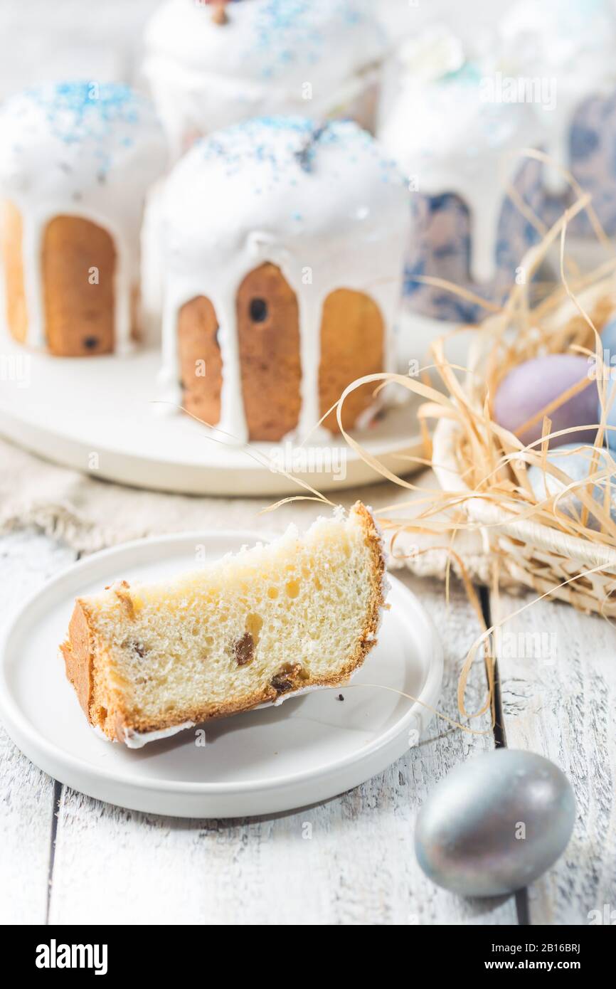 Easter table with Easter cakes and Easter eggs over white background Stock Photo