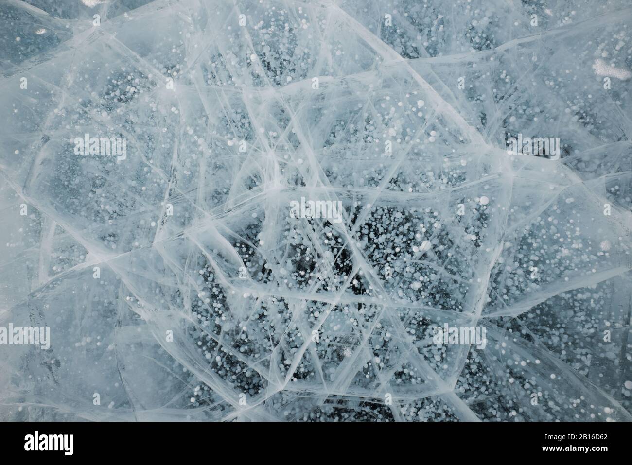 Polygonal structures of ice on Baikal Stock Photo