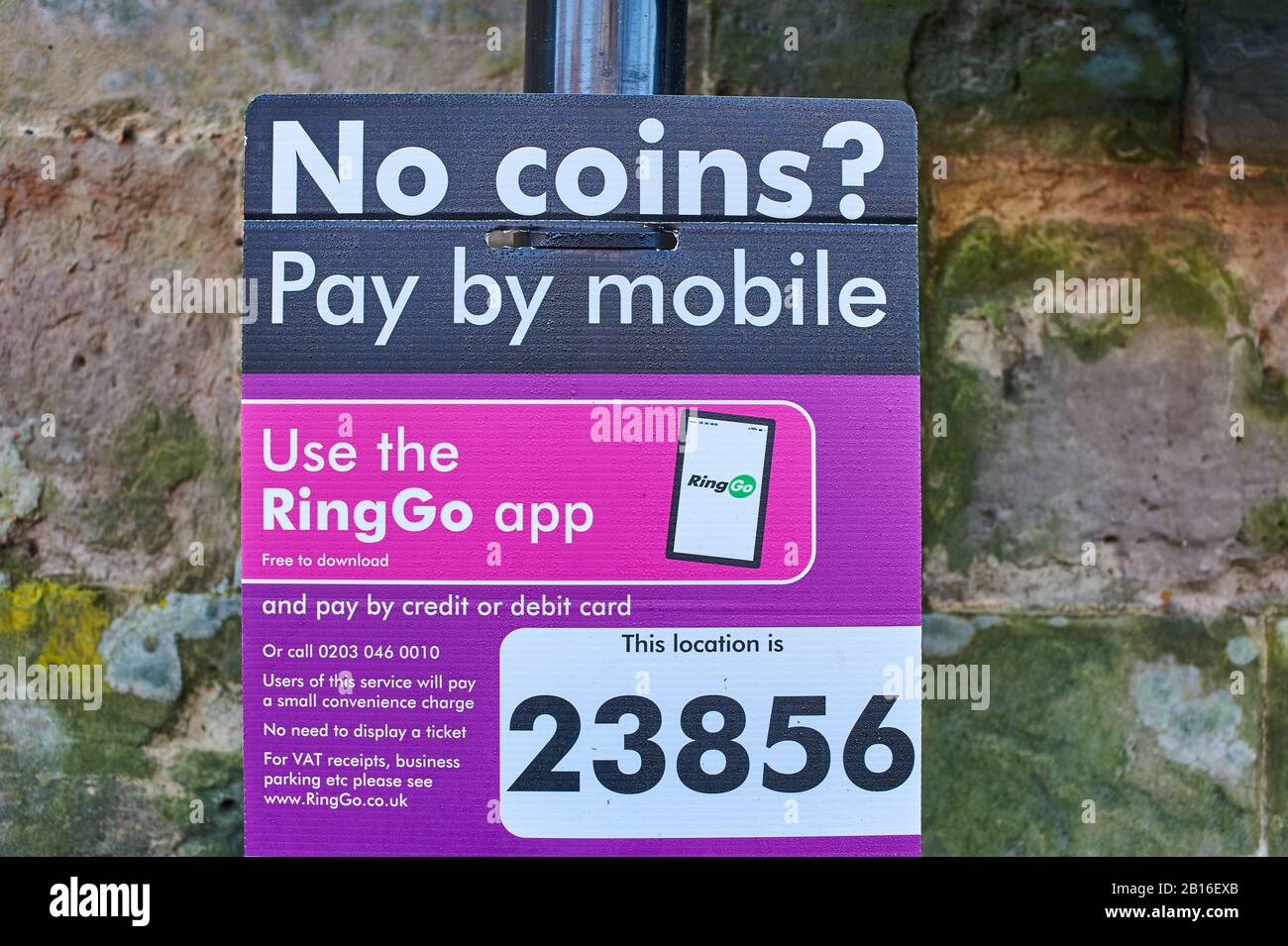 Sign on post advertising pay by mobile parking facility Stock Photo