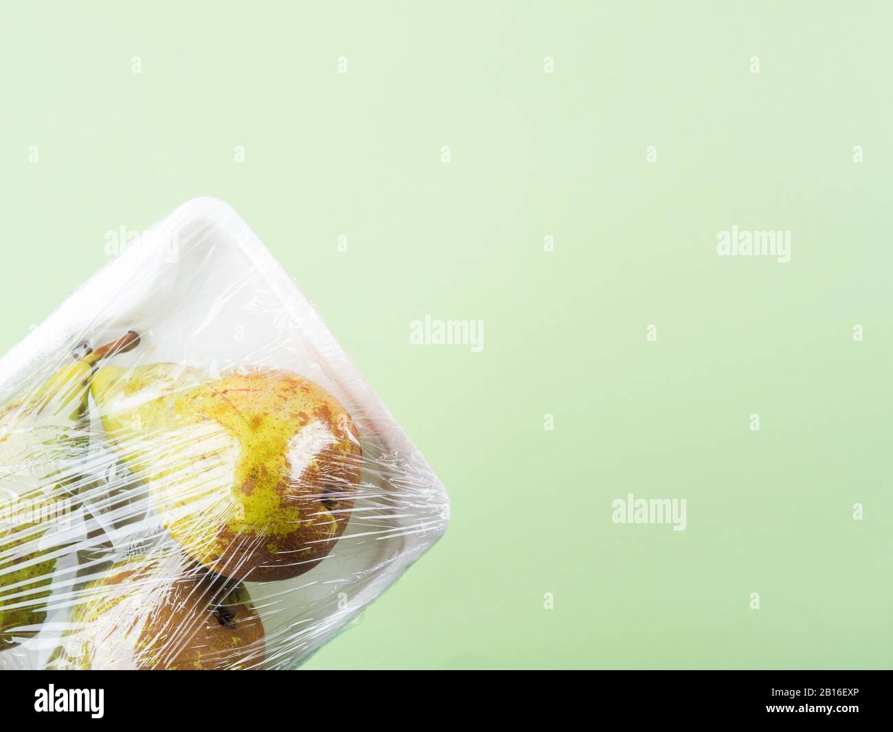 Fresh produce wrapped in plastic film Stock Photo Alamy