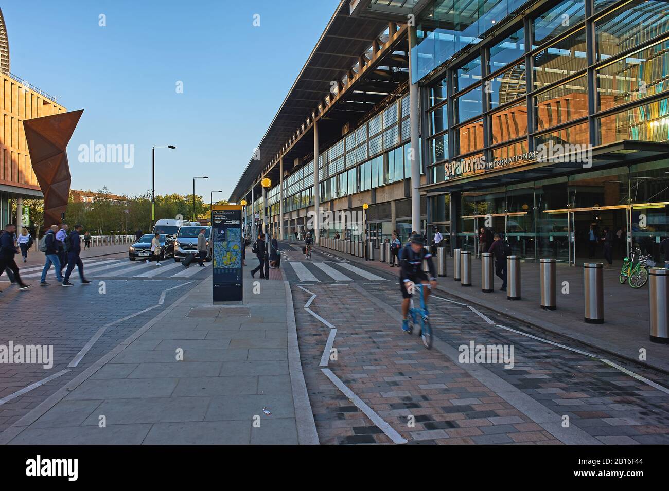 Commuters cycling to work on an urban street Stock Photo