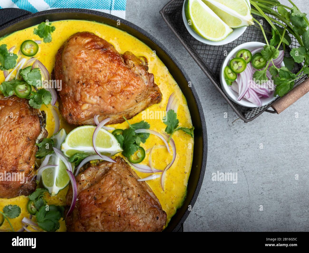 baked chicken thigh with curry sauce Stock Photo