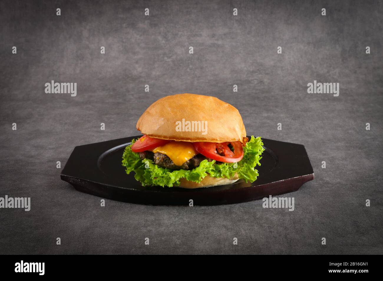 Beef burger Classic cheese burger with beef patty, pickles, cheese