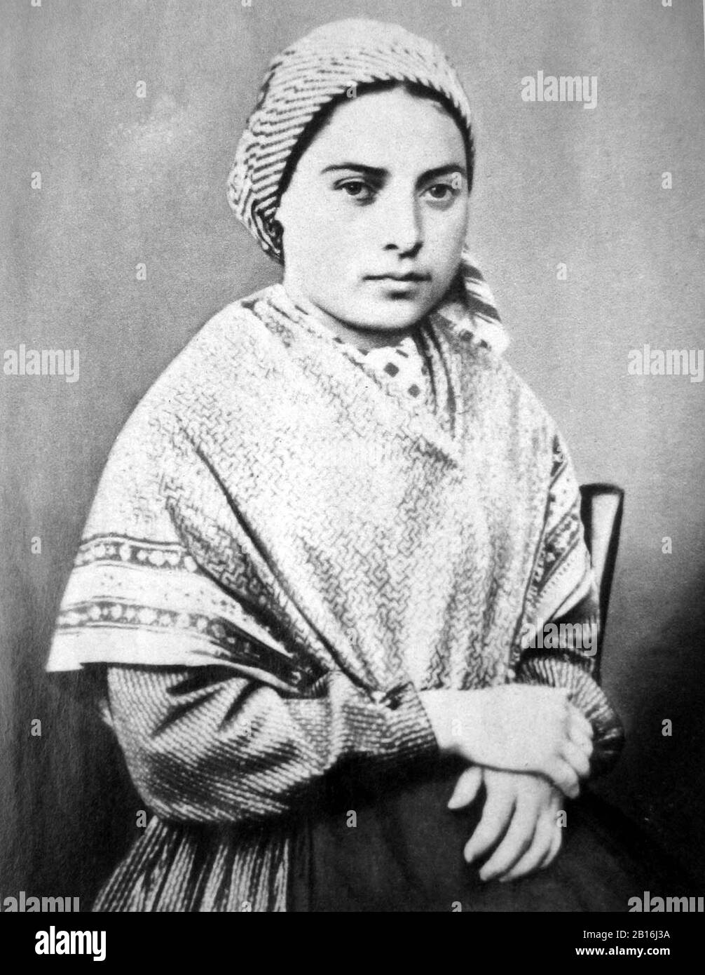 Saint Bernadette Soubirous (1844 – 1879), Saint Bernadette of Lourdes, was the firstborn daughter of a miller from Lourdes (Lorda in Occitan), in the department of Hautes-Pyrénées in France, and is best known for experiencing Marian apparitions of a 'young lady' who asked for a chapel to be built at the nearby cave-grotto at Massabielle. Stock Photo