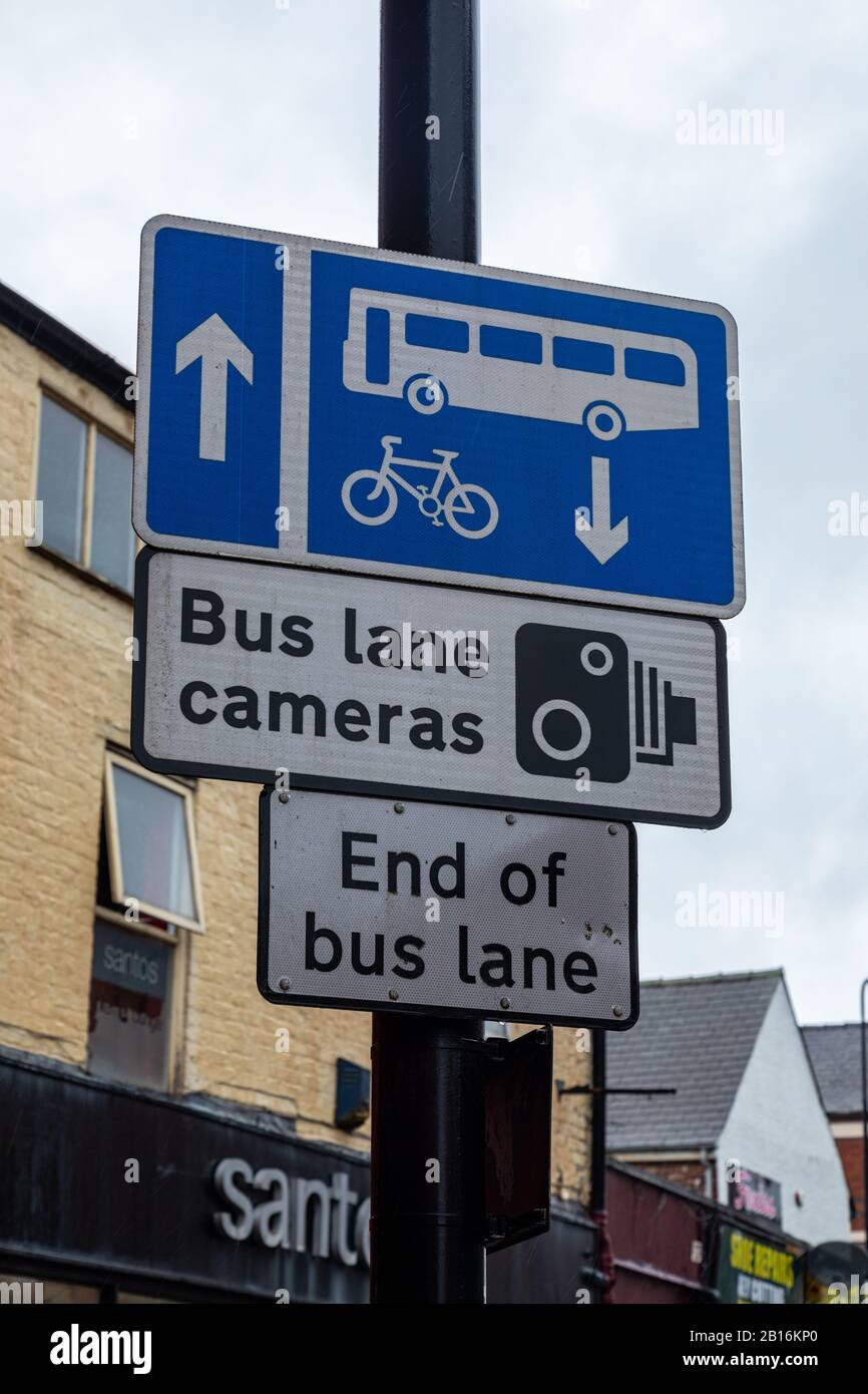 Close up of street signs for bus lanes and cameras in wigan lancashire