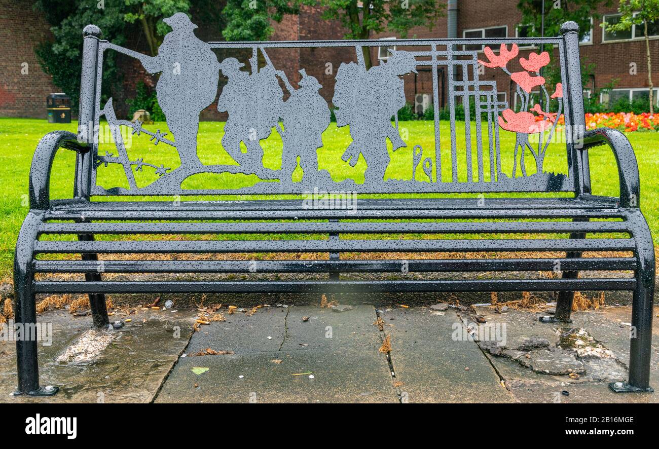 Stamps Soldiers-silhouetted-on-a-park-bench-in-wigan-lancashire-july-2019-2B16MGE