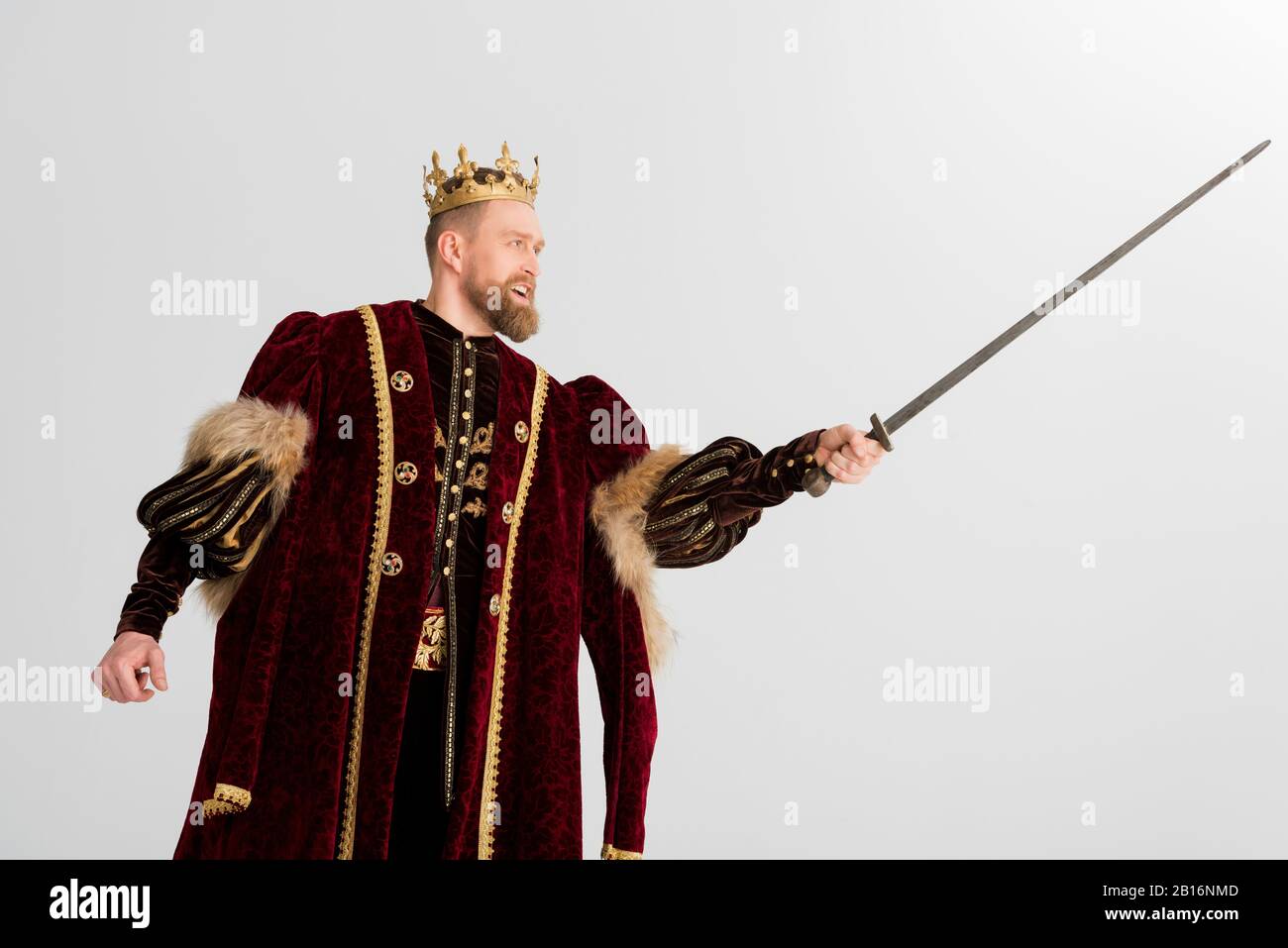 king with crown fighting with sword isolated on grey Stock Photo - Alamy