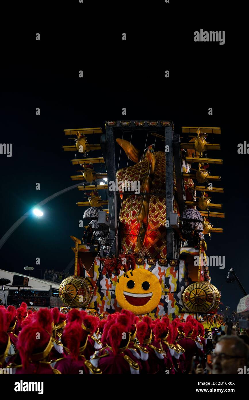 A local football team Samba school present a colorful and kid friendly parade: ''The laughter revolution' filled with clowns, jokers, movie and humour Stock Photo