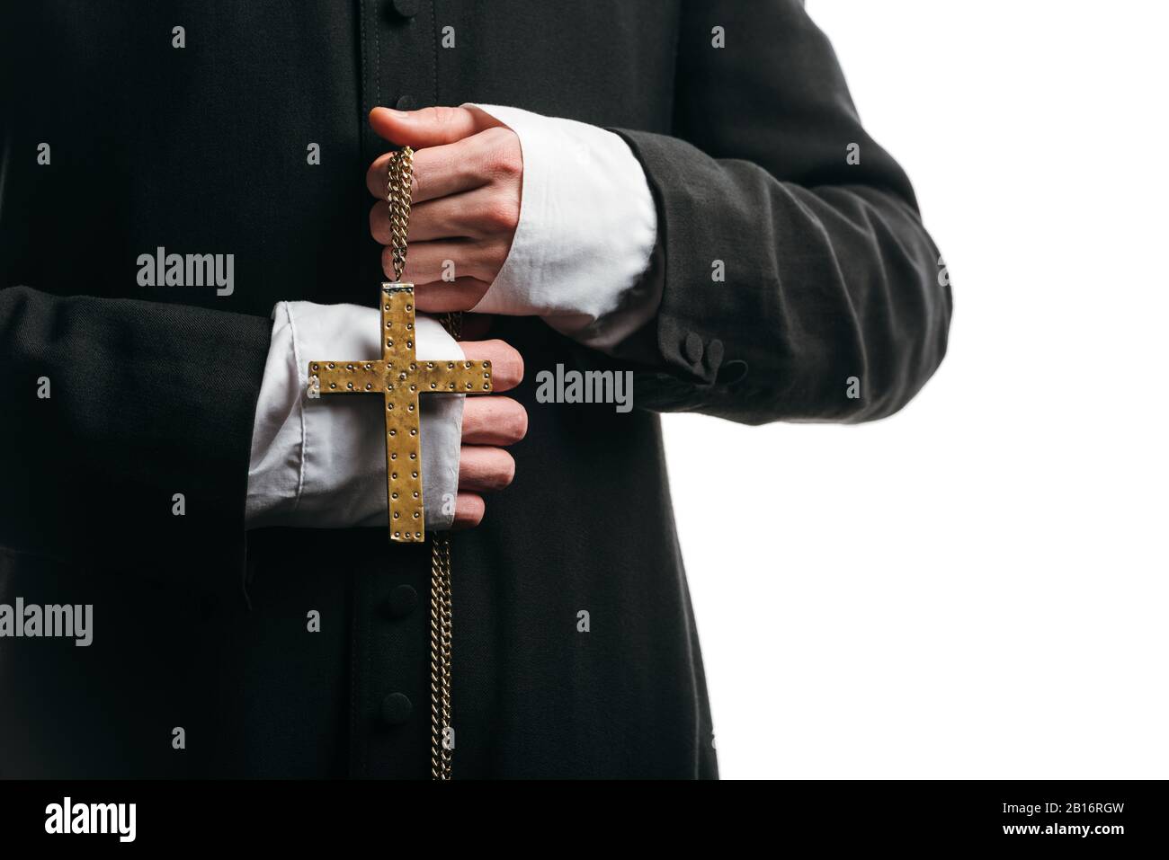 cropped view of catholic priest holding necklace with golden cross
