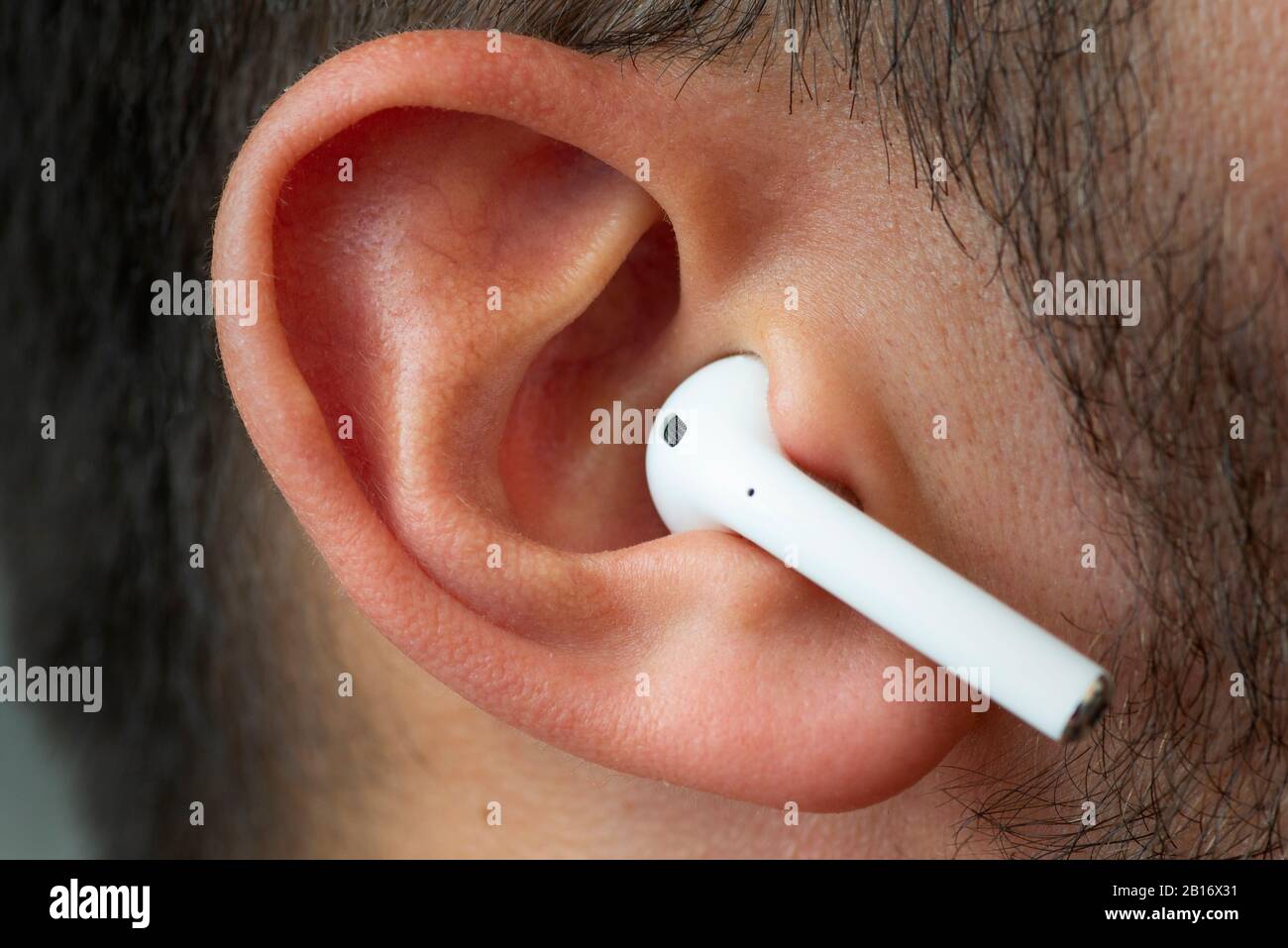 Izmir, Turkey - July 12, 2019: Close up shot of the one of Apple brand  airpods on a caucasian white males ear Stock Photo - Alamy