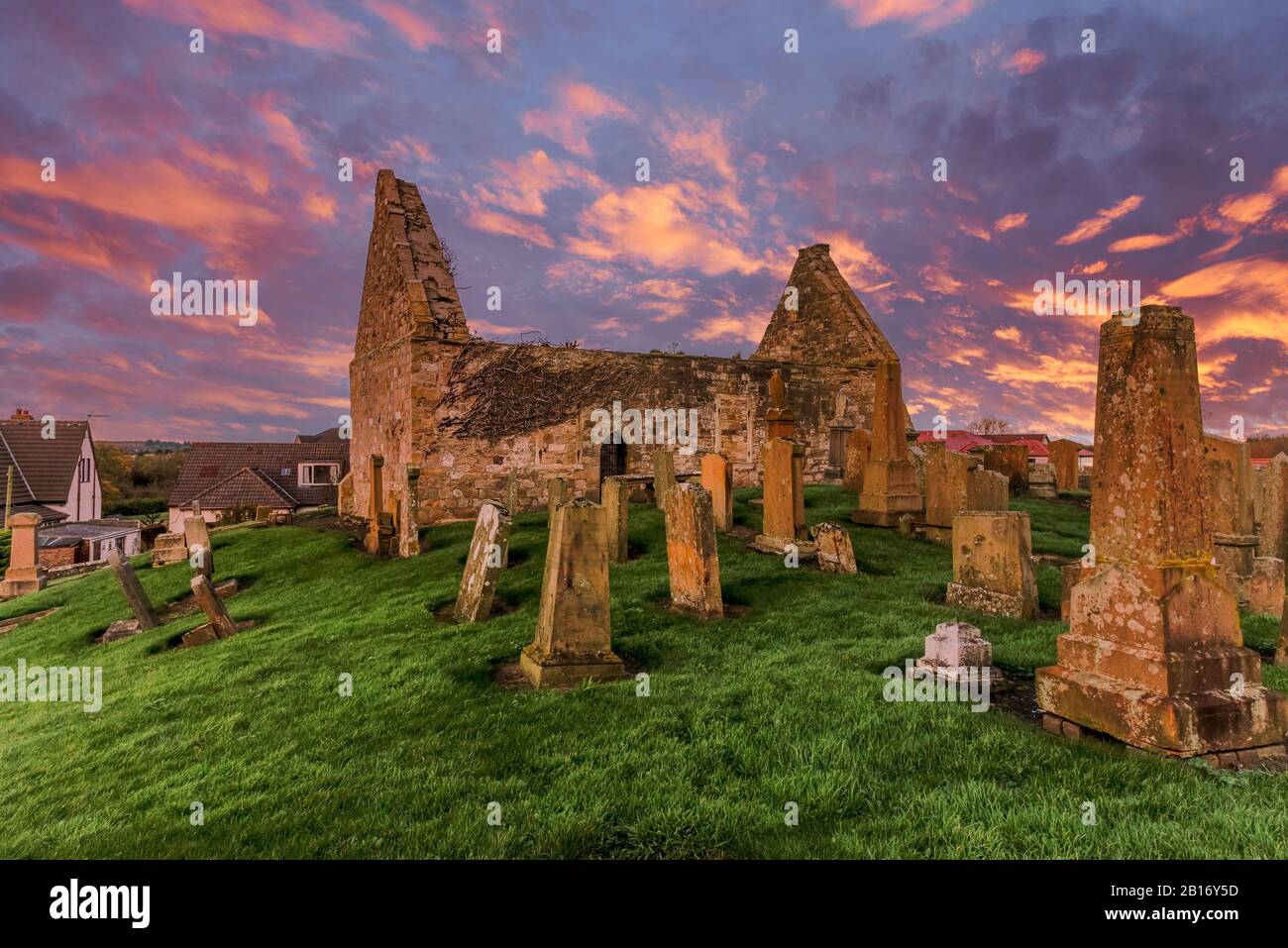 The Old Ruins of Prestwick Old Parish Church & Graveyard. Dedicated to St Nicholas Thought to date from the 12th Century and taken at the end of the d Stock Photo