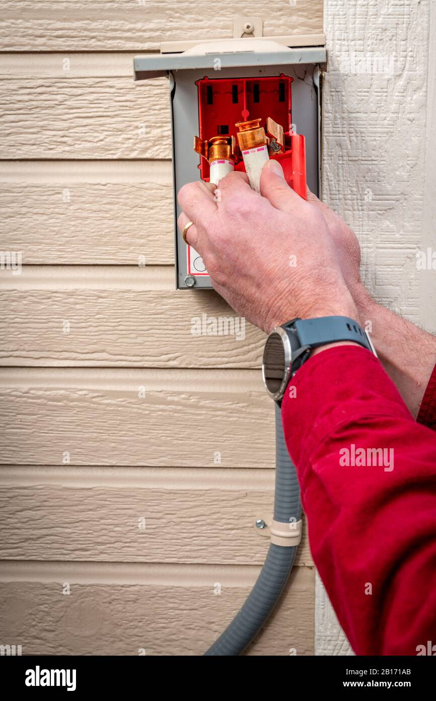 Fuse box replacement for an air conditioner Stock Photo - Alamy