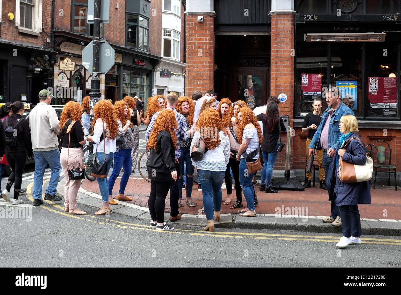 Hen Party Wearing Ginger Wigs In Dublin City Centre Ireland Stock Photo