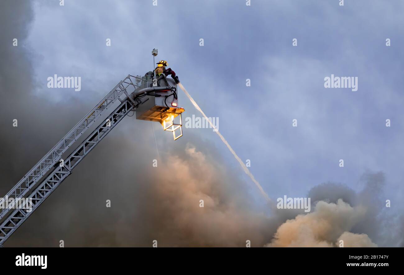 Fire truck hose spray hi-res stock photography and images - Alamy