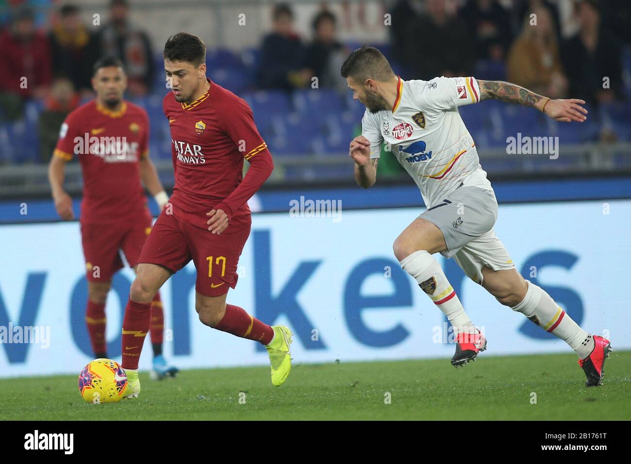 Rome, Italy. 23rd Feb, 2020. Rome, Italy - 23.02.2020: Cengiz Under (AS  ROMA), M.Calderoni (Lecce) in action during the Italian Serie A soccer  match 25 between As Roma vs Lecce, at Olympic