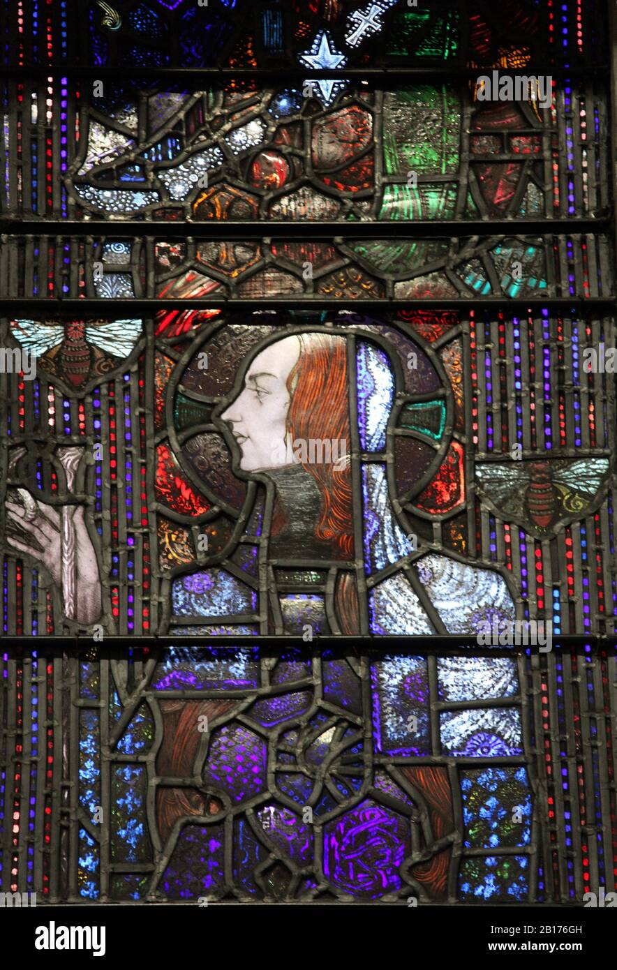 Saint Gobnait the patron saint of beekeepers in a stained glass window by Harry Clarke in the