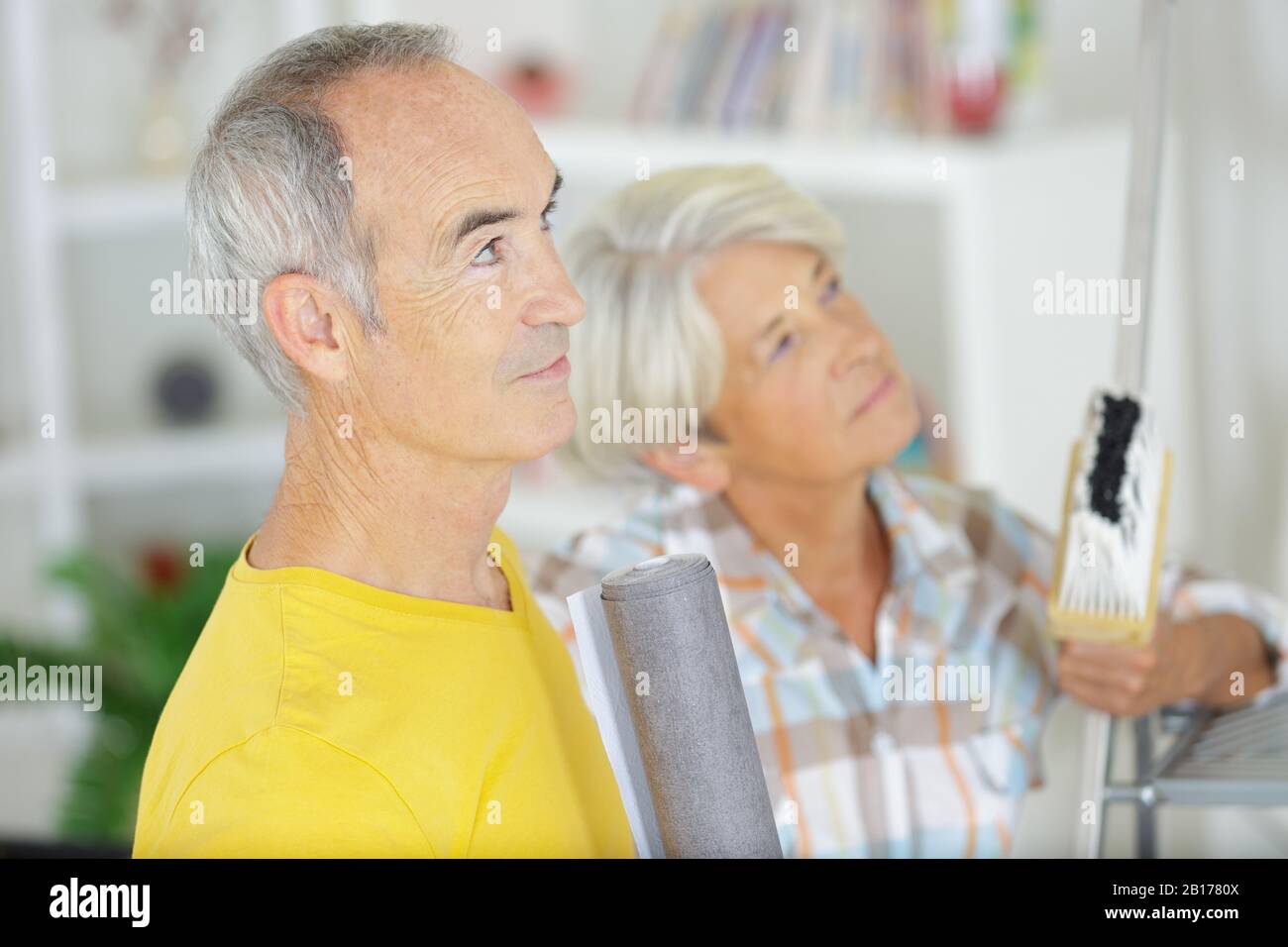 a senior couple facing wall Stock Photo