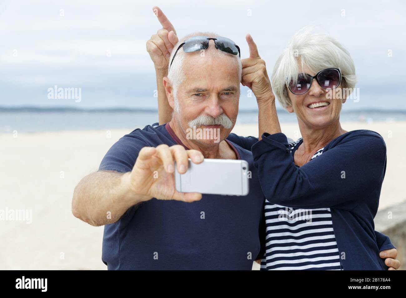 senior couple taking fun selfie Stock Photo - Alamy
