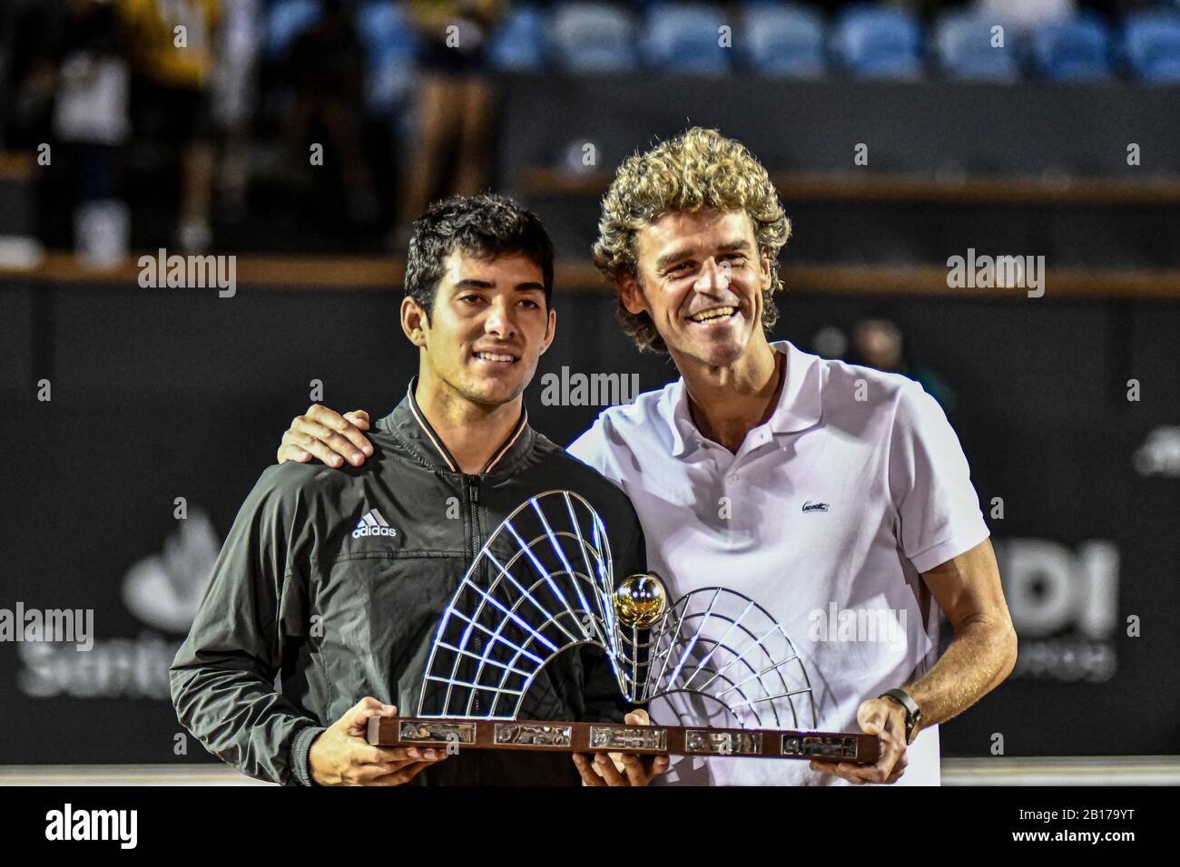 Rio De Janeiro, Brazil. 23rd Feb, 2020. Gustavo Kuerten, Guga, with  champion Cristian Garín (CHI) during Open Rio 2020, held at the Jockey Club of  Rio de Janeiro, this Sunday (23). Credit: