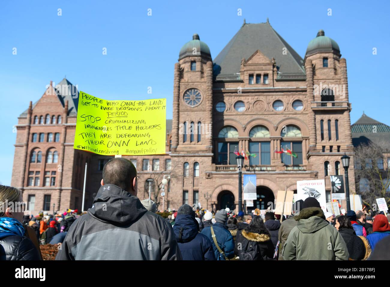 Anti-pipeline protesters outside the Ontario Legislative Building during the Shut Down Canada protests solidarity with the Wet'suwet'en. Stock Photo