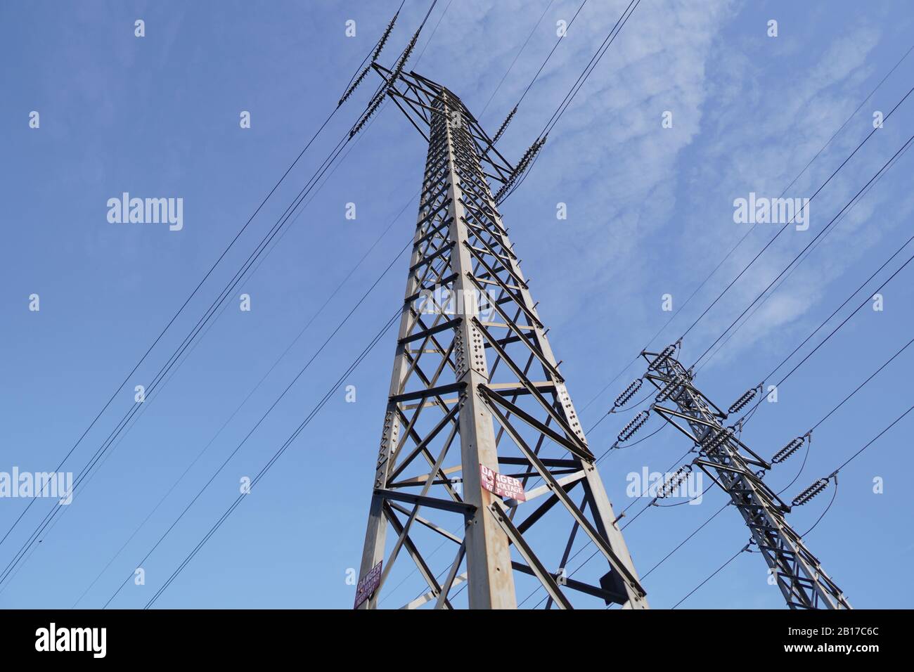 Overhead electrical tower with power lines Stock Photo Alamy