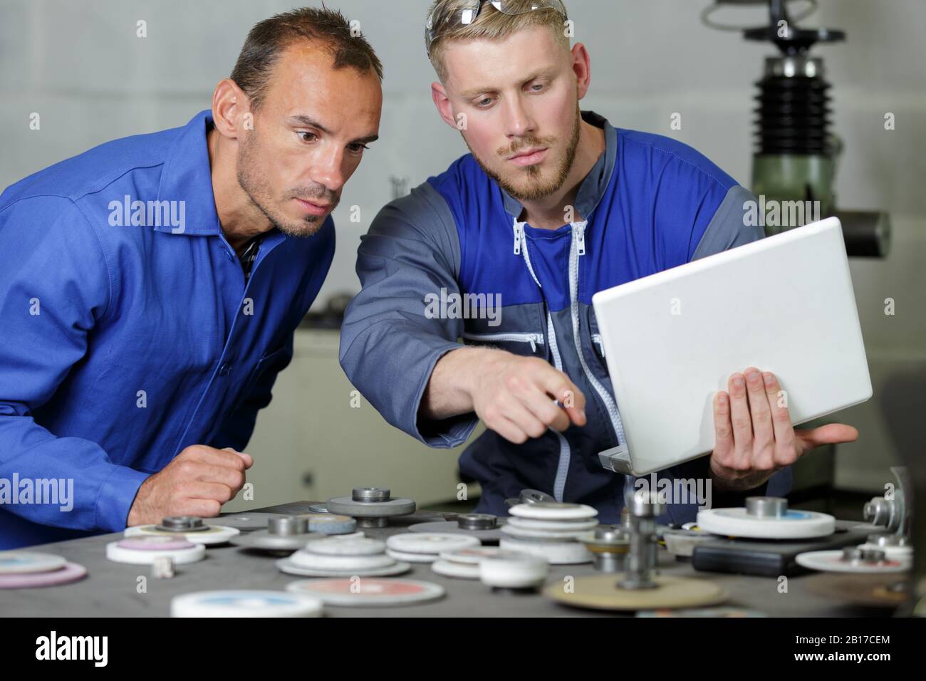 the mechanical engineers with laptop Stock Photo Alamy