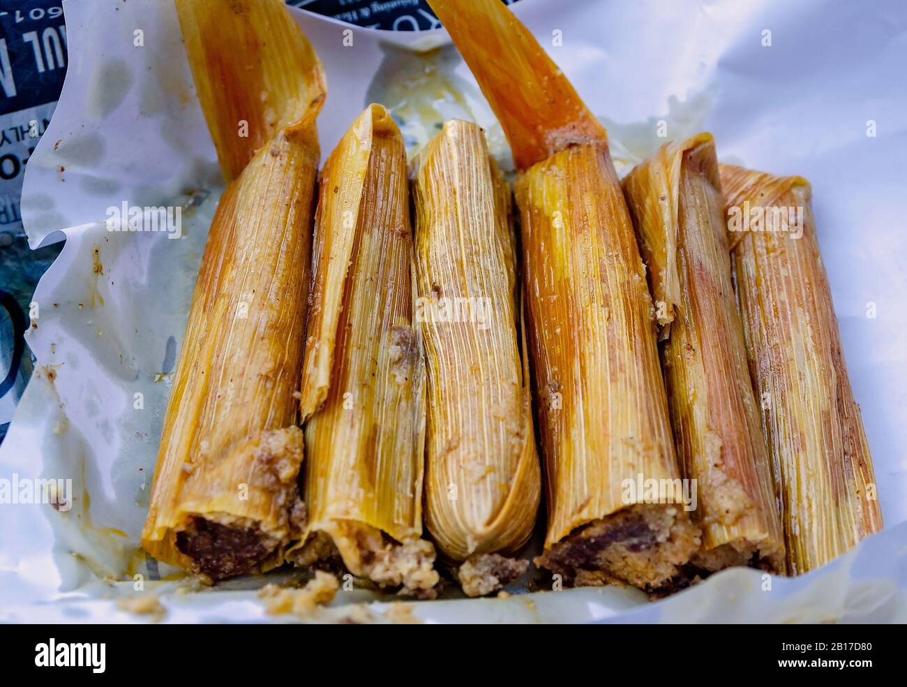 A to-go order of hot tamales is pictured at The Tamale Place restaurant, July 26, 2019, in Vicksburg, Mississippi. Stock Photo
