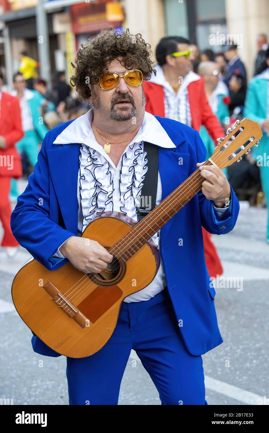 Traditional carnival in a Spanish town Palamos in Catalonia. Many people in costume and interesting make-up. 24. 02. 2020 Spain Stock Photo