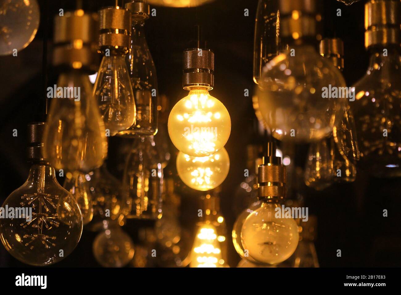 pile of LED light bulbs are decorated on the ceiling Stock Photo