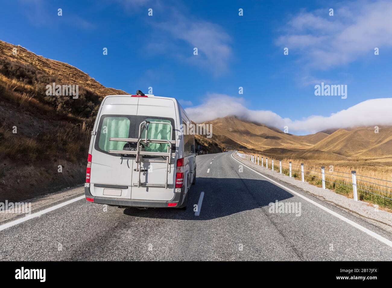 New Zealand, Motor home driving along State Highway 8 in Lindis Pass Stock Photo