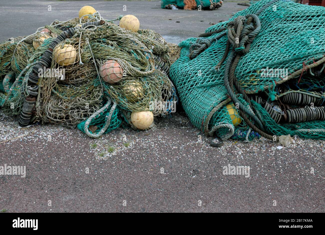 France, Brittany, Audierne, Fishing nets and buoys in harbor Stock Photo