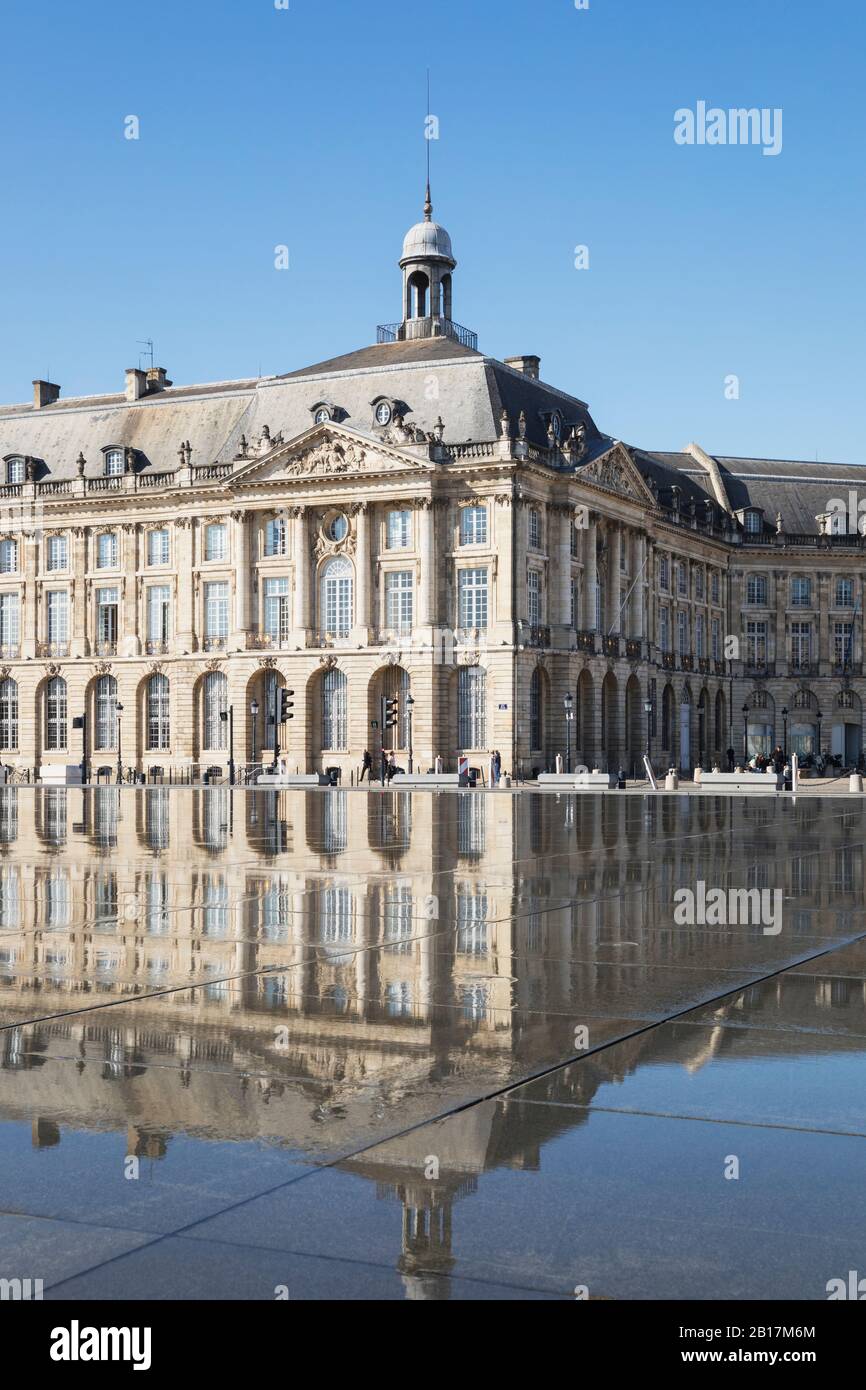 France, Gironde, Bordeaux, Place de la Bourse reflecting in Miroir dEau pool Stock Photo