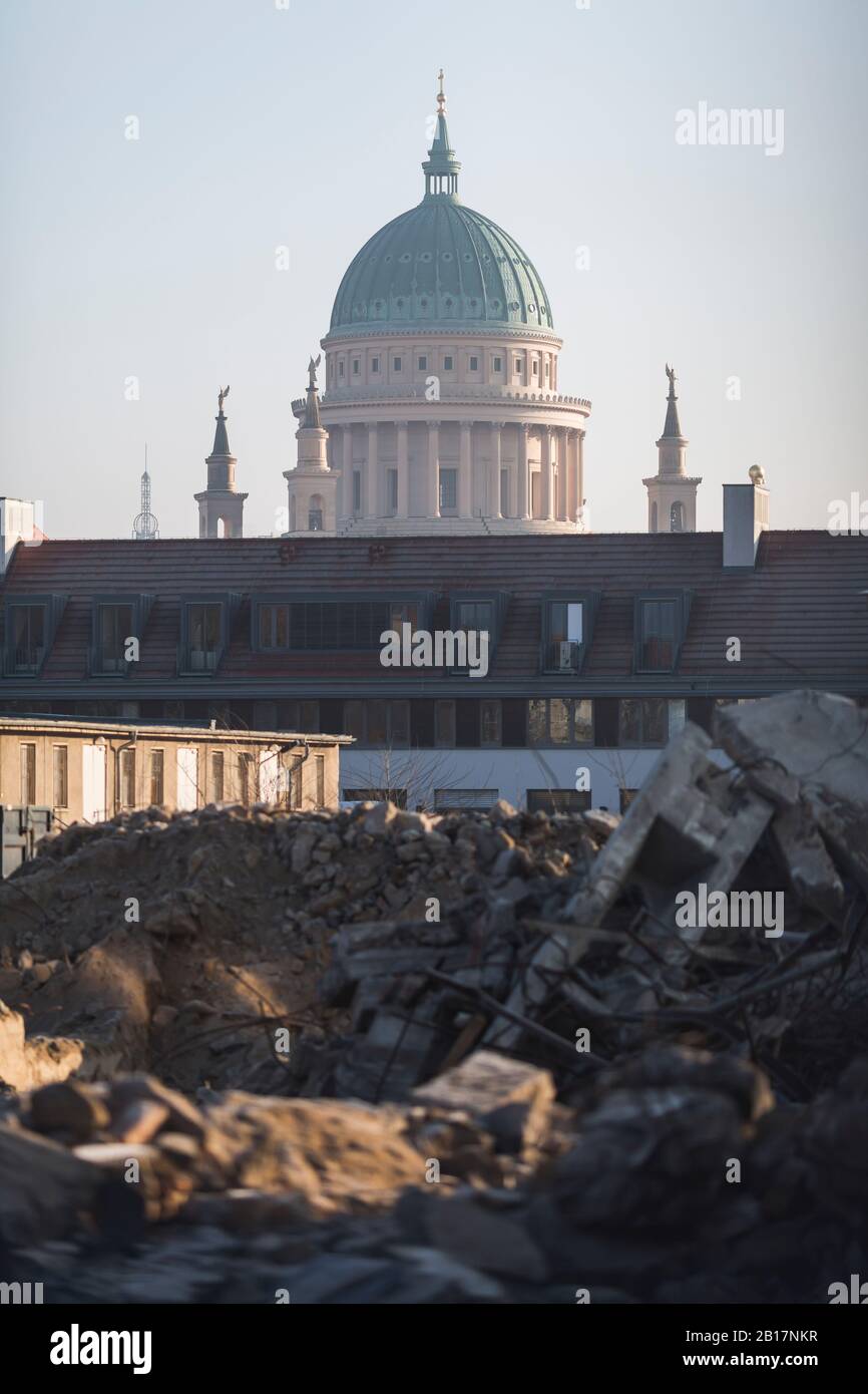 Germany, Potsdam, Rubble on construction site with St. Nicholas Church in background Stock Photo