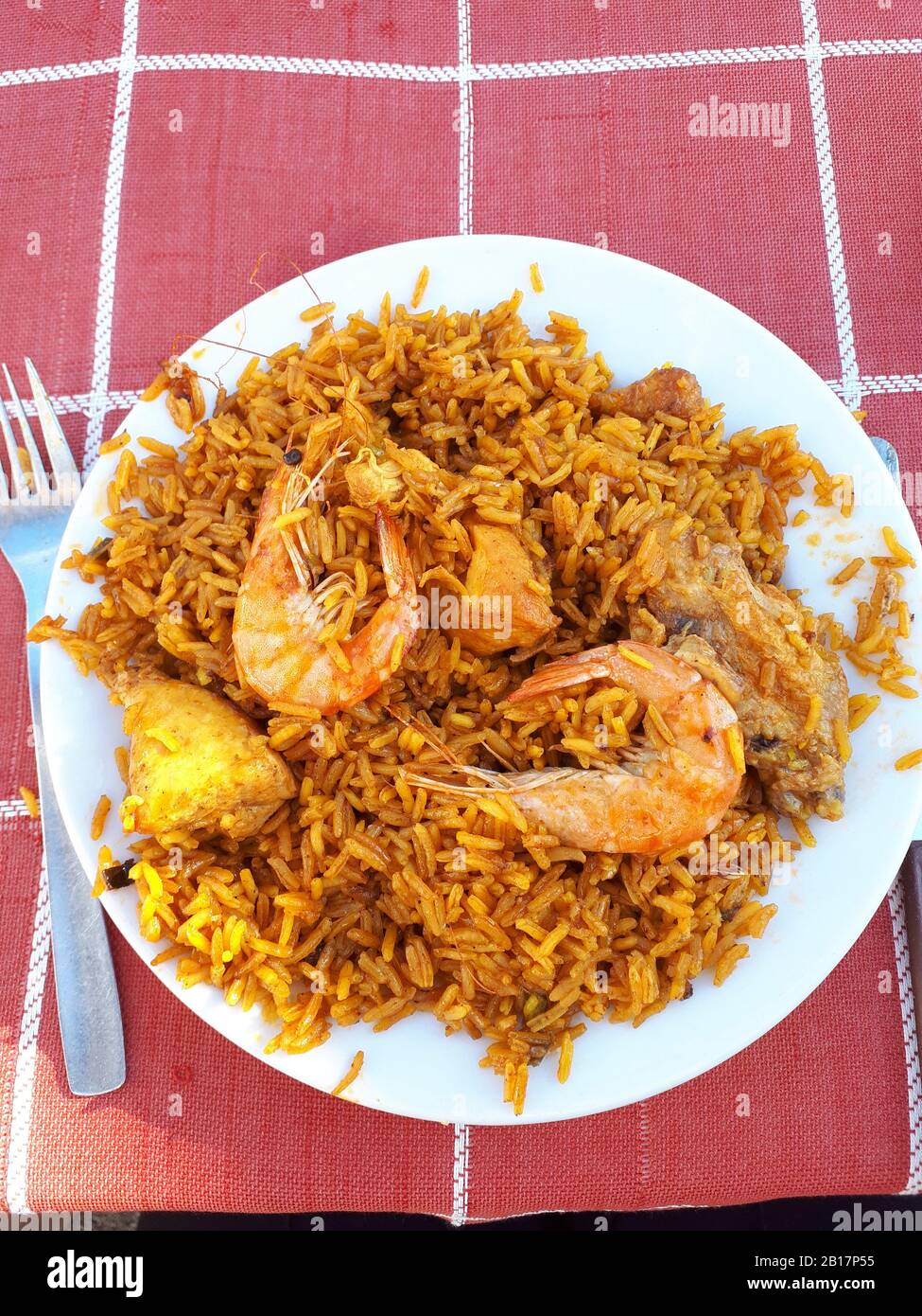Paella on the beach cooked in a huge pan over a wood fire is the best