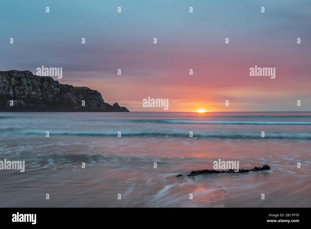 New Zealand, Purakaunui Bay at cloudy sunrise Stock Photo