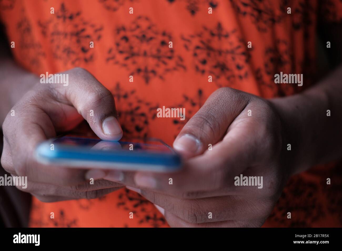 Close up of man hand use smart phone at night  Stock Photo