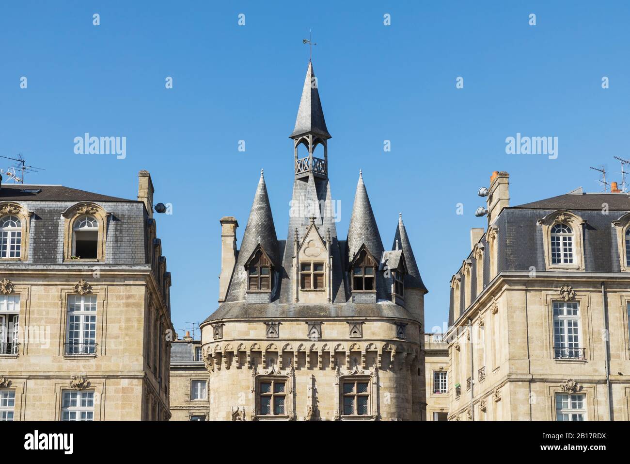 Porte cailhau medieval gate standing between old town residential