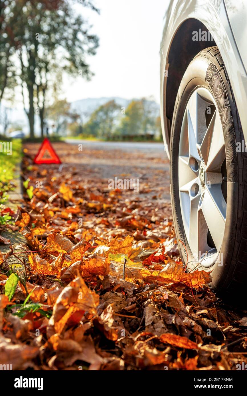 Germany, Lindenfels, Close-up of broken car on roadside Stock Photo