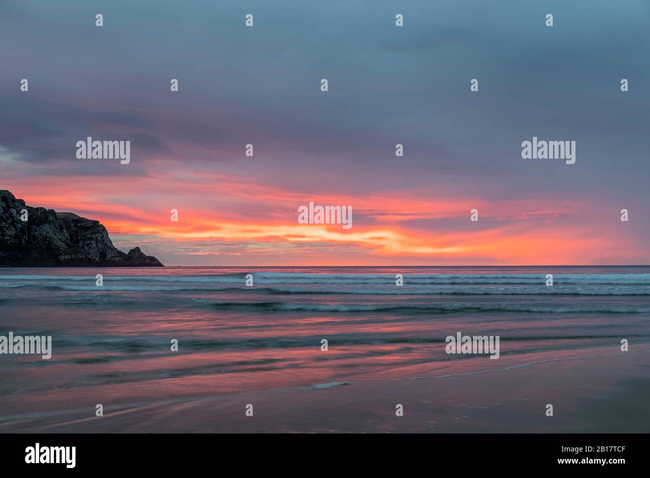 New Zealand, Purakaunui Bay at cloudy sunrise Stock Photo