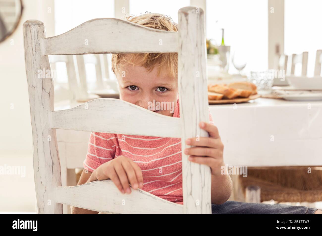 Shy boy smiling camera hi-res stock photography and images - Alamy