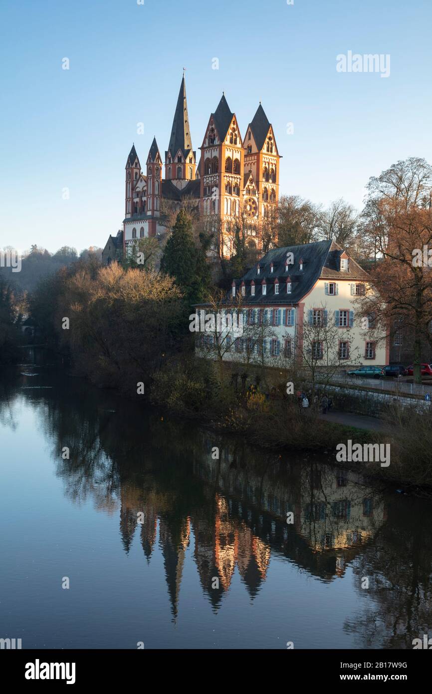 Germany, Hesse, Limburg an der Lahn, Limburg Cathedral reflecting in Lahn river Stock Photo