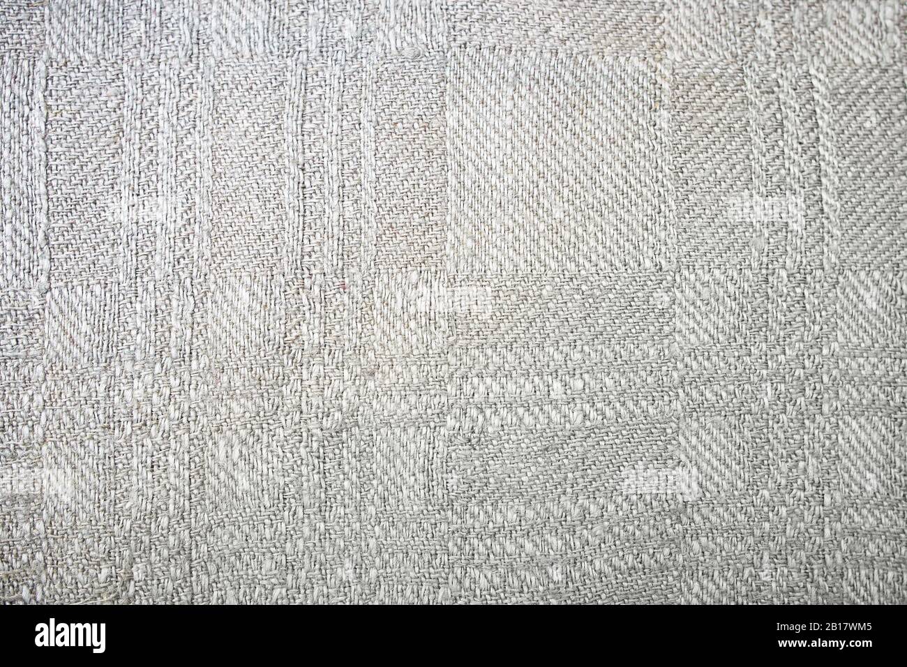 Gray handmade fabric texture. Abstract background, empty template. Stock Photo