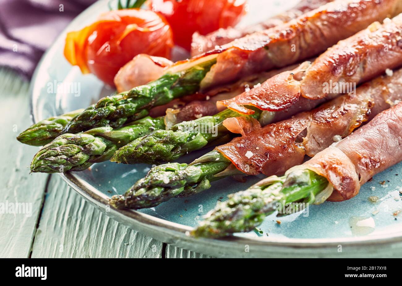 Plate of asparagus ham rolls Stock Photo Alamy