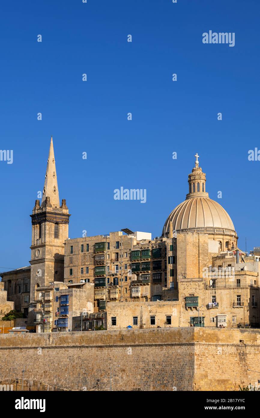 Malta, Valletta, St Paul Pro-Cathedral tower and Church of Our Lady of Mount Carmel dome Stock Photo