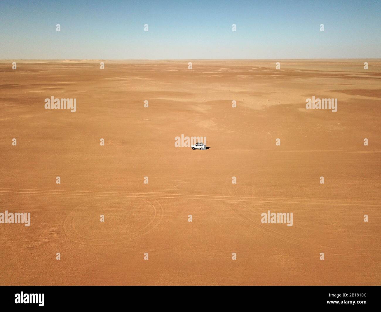 Mauritania, Banc dArguin National Park, Aerial view of off road car driving through desert Stock Photo
