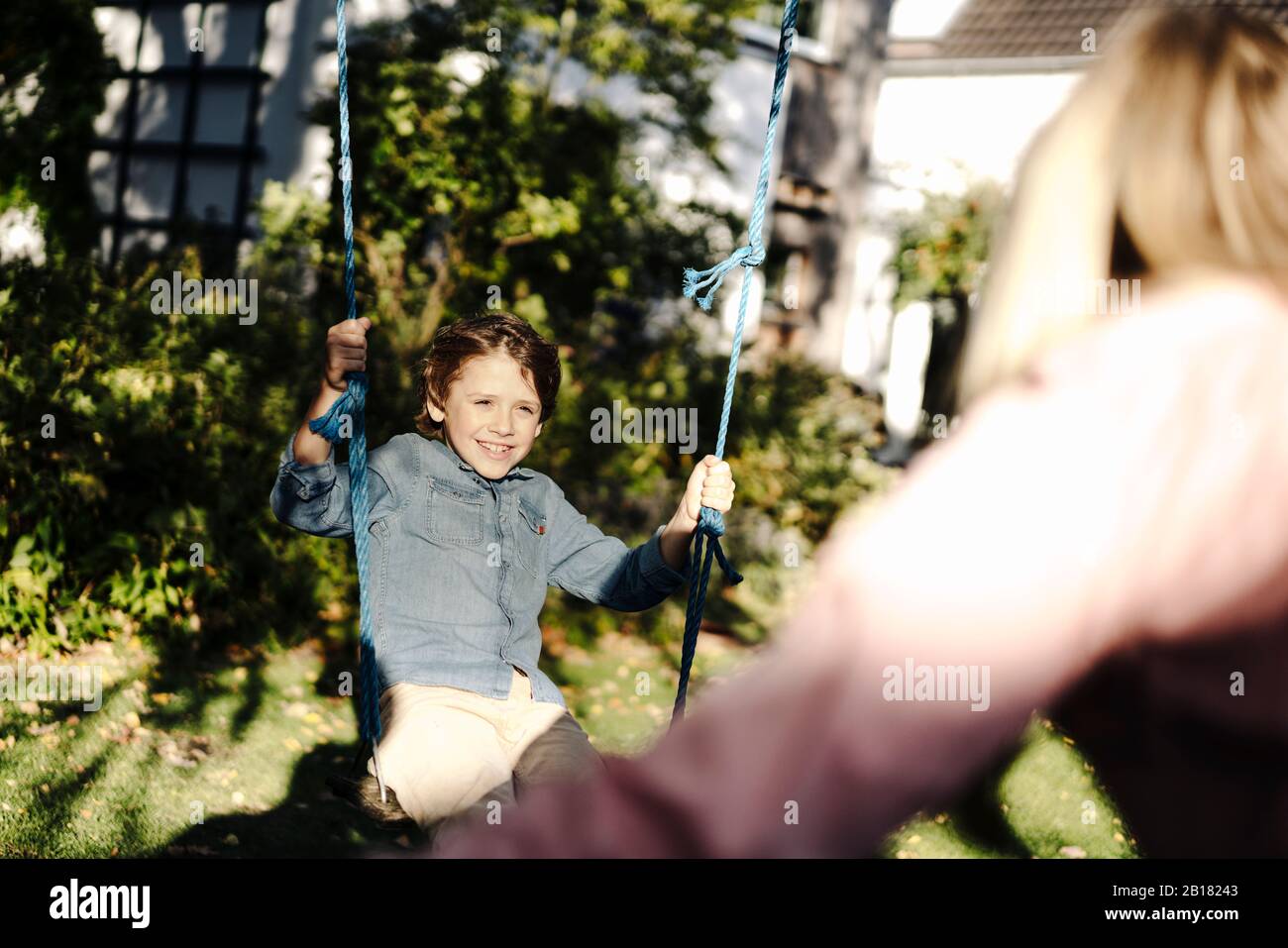 Mother son shadows hires stock photography
